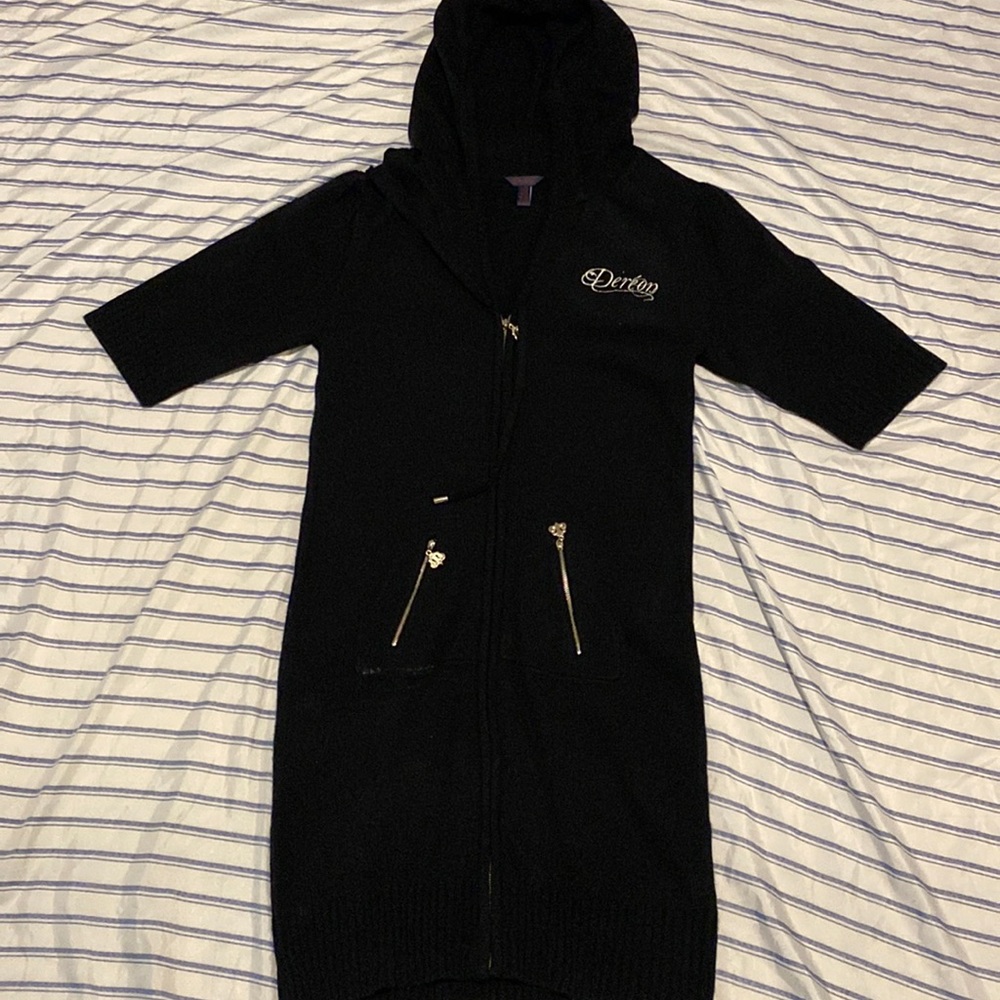 This is a Dereon short sleeve sweater dress